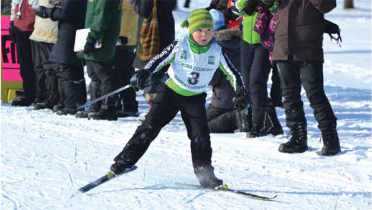 Child skiing competitively Child skiing competitively