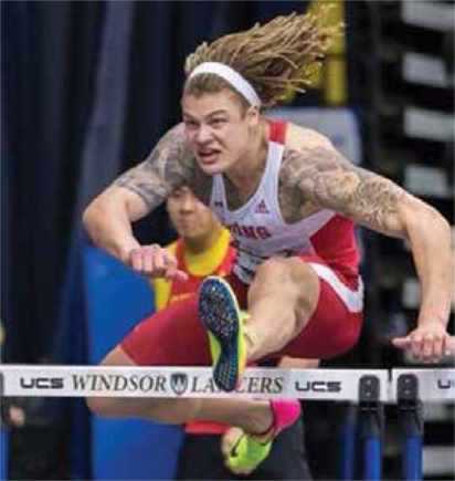 Kayden Johnson jumping hurdles at the Knights of Columbus games. Kayden Johnson jumping hurdles at the Knights of Columbus games.