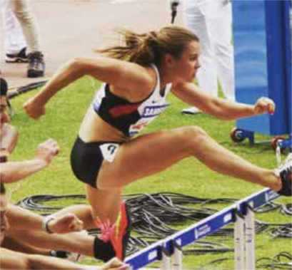 Michelle Harrison (Young) jumping hurdles at the Knights of Columbus games. Michelle Harrison (Young) jumping hurdles at the Knights of Columbus games.