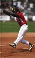 Baseball pitcher just before throwing a baseball Baseball pitcher just before throwing a baseball